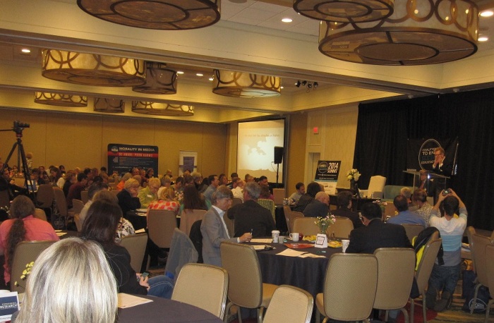 Pastor Jay Dennis, head of the Church at the Mall in Lakeland, Florida, speaks to those gathered for the Coalition to End Sexual Exploitation's Summit 2014, held at the Tysons Corner Marriott in Virginia on May 17, 2014.