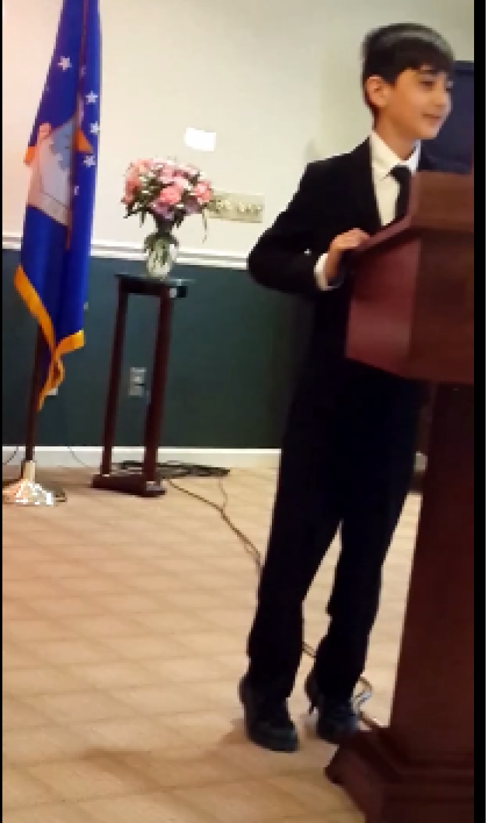 Orin Jenkins, 10, delivers the eulogy at his grandfather's funeral.