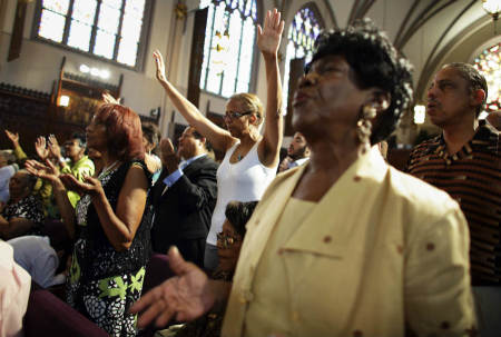 Parishioners worship at a predominantly African-American church in this file photo.