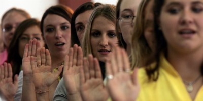 Peace Corps Cambodia volunteer English teachers swear in at the National Institute of Education in Phnom Penh.