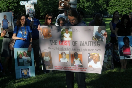 Candlelight vigil for adoptive parents of children stuck in the Democratic Republic of Congo, organized by Both Ends Burning, Washington, D.C., June 24, 2014.