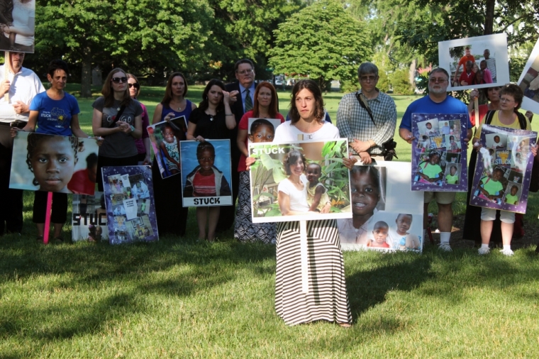 Candlelight vigil for adoptive parents of children stuck in the Democratic Republic of Congo, organized by Both Ends Burning, Washington, D.C., June 24, 2014.