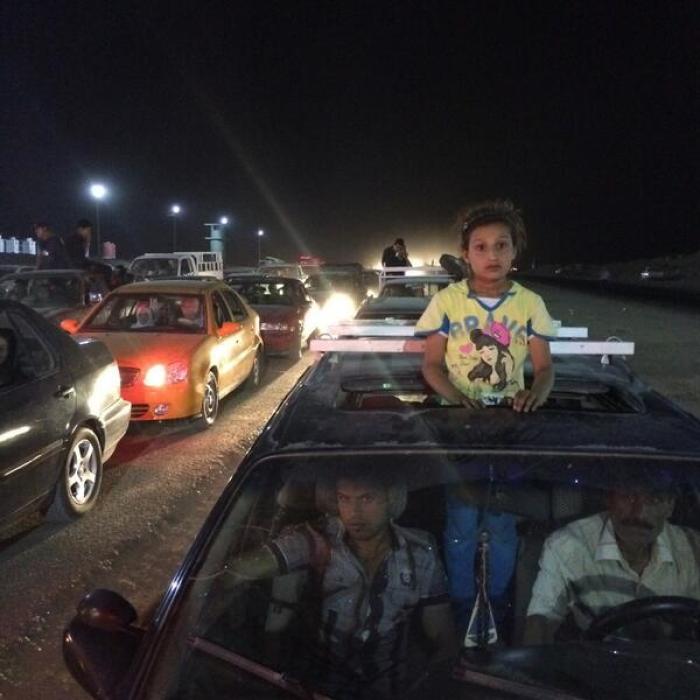 Assyrians and Kurds fleeing Bakhdida/Qaraqosh.