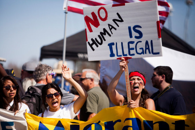 Demonstrators picket before the possible arrival of undocumented migrants who may be processed at the Murrieta Border Patrol Station in Murrieta, California July 4, 2014. Residents of the Southern California town confronted their mayor on Wednesday over the arrival of Central American migrants for processing after they slipped across the Mexico border into Texas, extending an influx that has swamped authorities there.