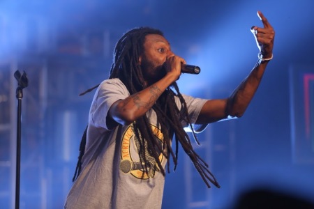 Rapper and spoken word artist Propaganda performs during The Heart Revolution Conference at Cornerstone Church in San Diego, Calif.