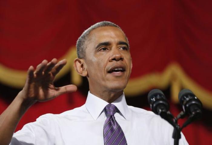 U.S. President Barack Obama talks about the economy at the Uptown Theater in Kansas City, Missouri, July 30, 2014.