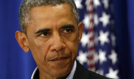 U.S. President Barack Obama delivers a statement on the shooting in Ferguson, Missouri and the situation in Iraq from his vacation on Martha's Vineyard, Massachusetts August 14, 2014.