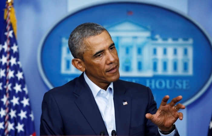 U.S. President Barack Obama speaks about developments in Iraq and civil unrest in Ferguson, Missouri, from the White House in Washington, Aug. 18, 2014.