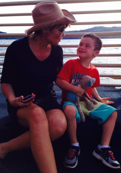 Sarah Palin enjoying the company of her son, Trig, who is six years old and has Down syndrome.