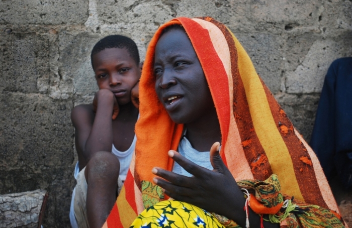 A woman talks about her escape from violence after Boko Haram insurgents attacked their community weeks ago, at the internally displaced persons camp at Wurojuli, Gombe State, Sept. 1, 2014. African leaders proposed on Tuesday creating a special fund to combat Islamist militant groups growing in strength from Kenya to Nigeria. African Union states announced the idea after Nairobi, Kenya, talks on a problem highlighted on Tuesday by capture of a town in north-eastern Nigeria by Boko Haram militants. Fighting killed scores of people, according to security forces, and sent at least 5,000 fleeing.