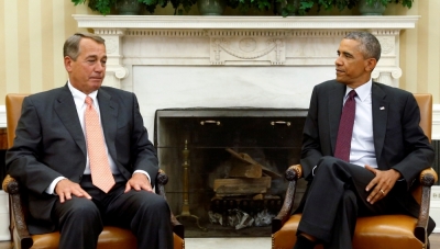 U.S. President Barack Obama meets with Speaker of the House John Boehner (L) and other Congressional leaders in the Oval Office of the White House in Washington to discuss his plan to combat Islamic State militants operating in Iraq and Syria, Sept. 9, 2014.