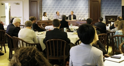 Lisa Waters Hinson (L), Charlie Peacock, and Mark Rodgers (R), discuss engagement of the secular world in Christian music and films at the American Enterprise Institute's Evangelical Leadership Summit in Washington, Sept. 10, 2014.