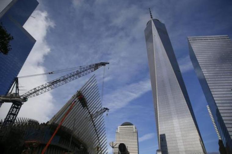 9/11 Memorial Site With Freedom Tower in the background.