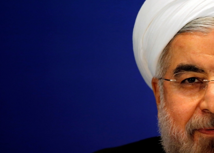 Iran's President Hassan Rouhani attends a news conference at a hotel after the fourth Conference on Interaction and Confidence Building Measures in Asia summit, in Shanghai, China, May 22, 2014.