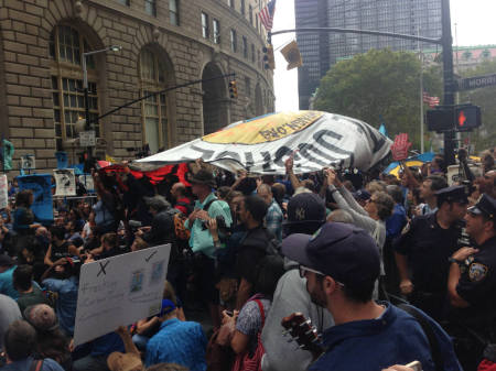 #FloodWallStreet protesters descended on the financial district in New York City on Monday, Sept. 22, 2014.