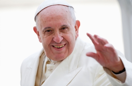 Pope Francis waves as he leads the general audience in Saint Peter's Square at the Vatican, Rome, Italy, September 24, 2014.