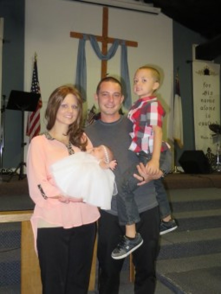 Ashley Bridges, fiance Jonathon and son Braiden celebrating daughter Paisley's dedication September 14