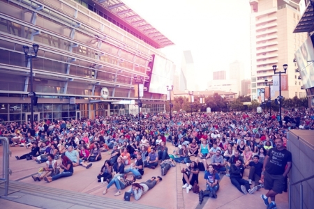 Greg Laurie, senior pastor of Harvest Christian Fellowship in Riverside, California and Harvest Orange County in Irvine, California, shares the Gospel with a sold-out crowd of 19,000 for Harvest America at the American Airlines Center and Victory Park in Dallas, Texas, Oct. 5, 2014.