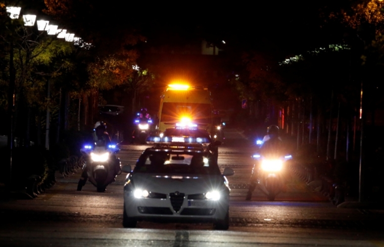 An ambulance carrying a Spanish nurse who was infected by Ebola, leaves Alcorcon's hospital, near Madrid,Spain, October 7, 2014. A Spanish nurse has become the first person to contract Ebola outside of Africa, casting doubt over measures taken in Spain to control the potential spread of the deadly disease.