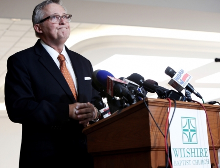 Pastor George Mason speaks to the media about the death of Thomas Eric Duncan from Ebola during a press conference at Wilshire Baptist Church in Dallas, Texas, October 8, 2014. The first person diagnosed with Ebola in the United States, Liberian national Thomas Eric Duncan, died Wednesday morning, a hospital spokesman said.