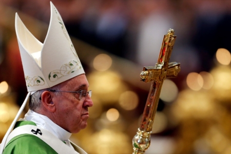 Pope Francis leaves after leading a thanksgiving mass for Canadian Saints in St.Peter's Basilica at the Vatican, October 12, 2014.