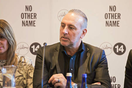 Pastor Brian Houston of Hillsong Church speaks at a press conference on Thursday, Oct. 16, 2014, at The Eventi Hotel in New York City.