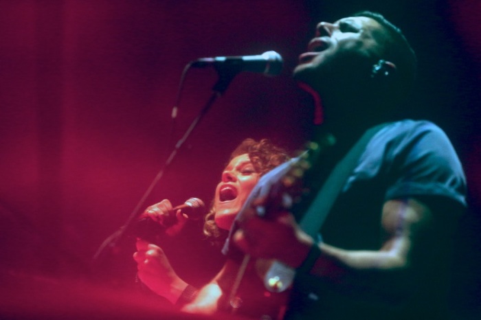 Taya Smith and Jadwin Gillies lead a crowd of 17,000 at the Forum in Los Angeles in worship songs by Hillsong, Oct. 23, 2014.