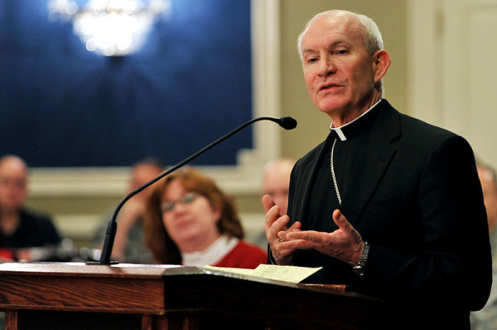 Archbishop of Omaha, George Lucas, addresses the importance of prayer at the national prayer luncheon at the Patriot Club at Nebraska's Offutt Air Force Base.