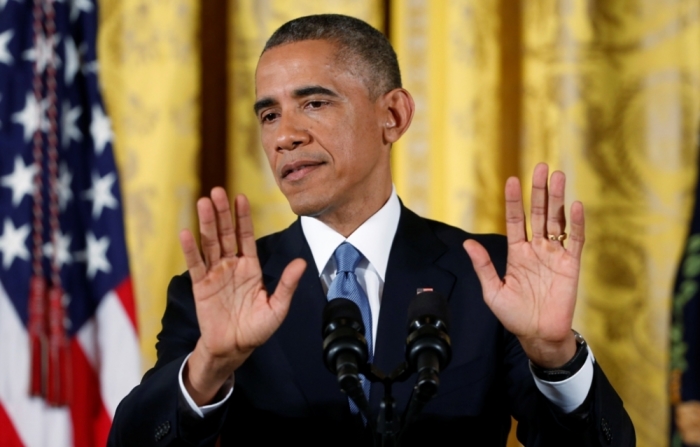 U.S. President Barack Obama answers questions during a news conference in the East Room of the White House in Washington, November 5, 2014. The president addressed reporters one day after after Republicans seized control of the U.S. Senate and captured their biggest majority in the House of Representatives in more than 60 years.