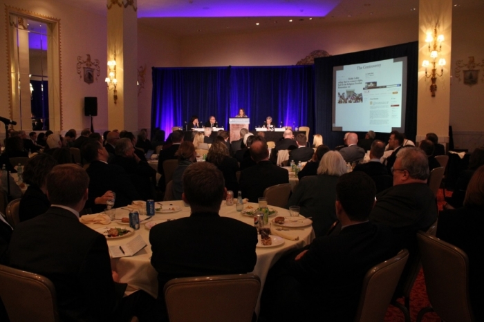 Audience members listen at a panel discussing religious liberty since the US Supreme Court decision Burwell v. Hobby Lobby Inc. at the Federalist Society's annual National Lawyers Convention, held at the Mayflower Hotel in Washington, DC on Thursday, November 13, 2014.