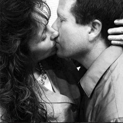 Jim Bob and Michelle Duggar recreate Ben and Jessa's kissing picture.