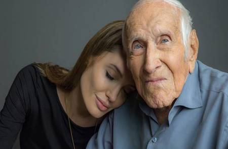 Louis Zamperini with 'Unbroken' Director Angelina Jolie