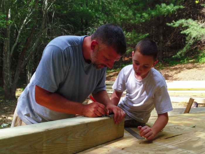 'Risk it All' stars Ben and David Kemp working on their deck.