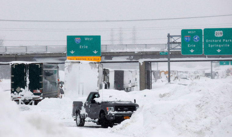 Vehicles litter the highway in West Seneca.