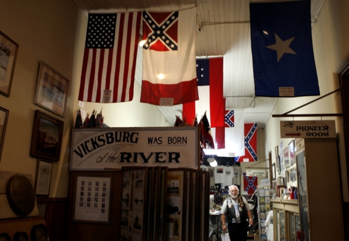 The U.S. flag shares space with that of the Confederates at the Old Courthouse Museum in Vicksburg, Mississippi, September 7, 2005.