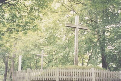 Grave adorned with cross in Shingo, Japan. According to local legend, the cross marks the grave of Jesus, who escaped the crucifixion and lived to age 106 in the village.