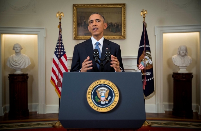 U.S. President Barack Obama announces a shift in policy toward Cuba while delivering an address to the nation from the Cabinet Room of the White House in Washington, December 17, 2014.The shift in policy follows Cuba's release of American aid worker Alan Gross after five years in prison in a reported prisoner exchange with Havana.