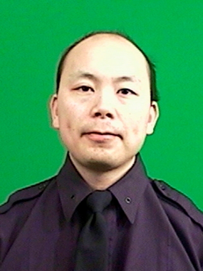 New York Police Officer Rafael Ramos, 40, is seen in an undated picture provided by the New York Police Department December 20, 2014. A gunman ambushed and fatally shot two New York City police officers on Saturday identified as Liu, 32, and Ramos, 40, who had a 13-year-old son.