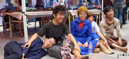 North Korean defectors expressing joy in the fact that they have reached South Korea.