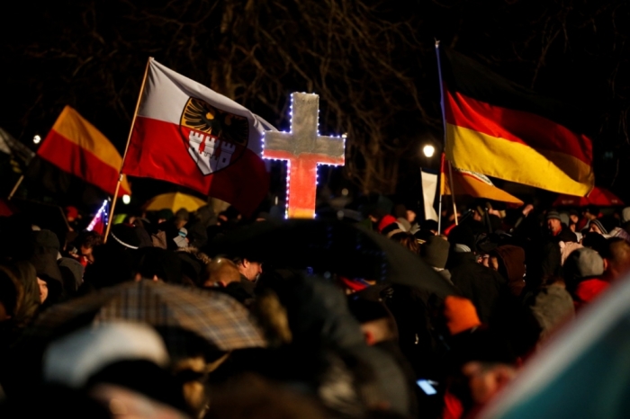 Participants take part in a demonstration called by anti-immigration group PEGIDA, a German abbreviation for 'Patriotic Europeans against the Islamization of the West,' in Dresden January 5, 2015. Several thousand opponents of Germany's policy toward asylum seekers and Islam are expected to attend the protest in the eastern German town on Monday.