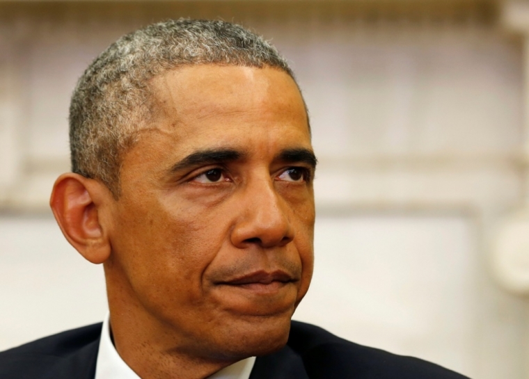 U.S. President Barack Obama makes a statement about the mass shooting in Paris, while in the Oval Office at the White House in Washington, January 7, 2015. Obama on Wednesday condemned the deadly shooting at a magazine office in Paris on Wednesday, calling it a terrorist attack against its ally, France.