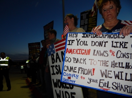 Protesters rally outside the 'Stand with the prophet against hate and terror' event sponsored by Sound Vision Foundation to 'challenge growing Islamophobia in American society,' at the Garland Independent School District's Curtis Culwell Center in Garland, Texas, January 17, 2014.