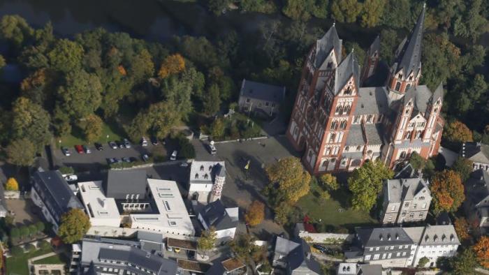 Limburg cathedral (R) and the ensemble of the bishop's residence (L), where German Catholic bishop Franz-Peter Tebartz-van Elst has spent tens of millions of dollars on his residence.