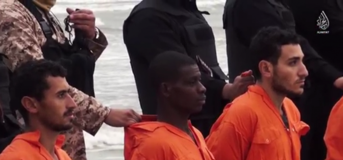 Ghanaian Christian Matthew Ayariga (middle) is shown in an Islamic State execution video in which he and 20 Coptic Christians from Egypt were beheaded on a beach in Sirte, Libya in February 2015. 