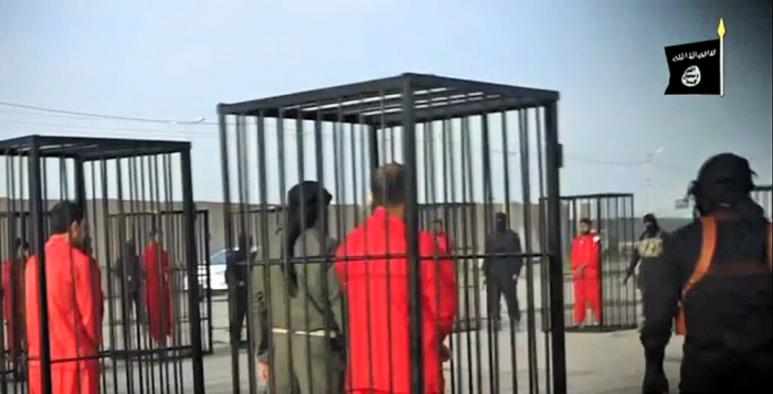 ISIS released a video showing caged Kurdish soldiers being paraded on Iraqi streets.