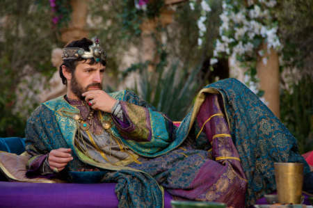 Antipas (Eoin Macken) watches while Salome dances for him in National Geographic's 'Killing Jesus.'