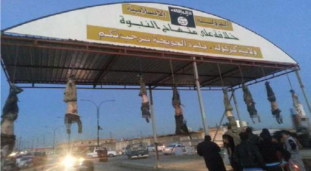 Eight dead bodies dangle at the entrance to the Iraqi city of Hawija.