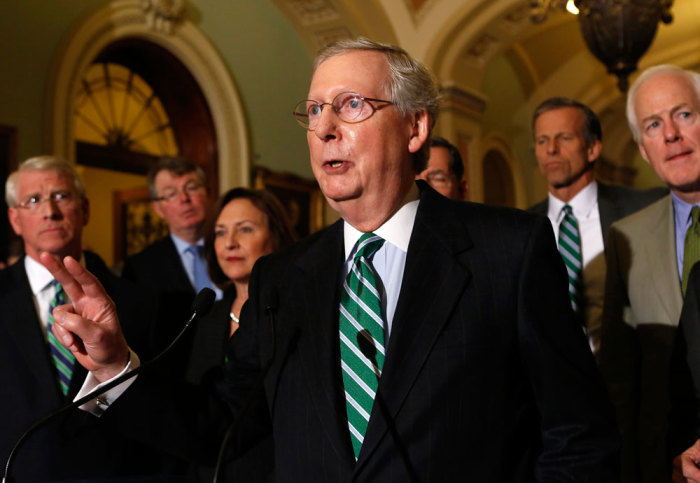 U.S. Senate Majority Leader Mitch McConnell (R-KY) talks to the media after a weekly Senate caucus luncheon on Capitol Hill in Washington March 17, 2015.