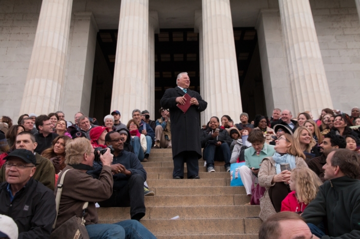 Amos Dodge, leading pastor of Capital Church in Vienna, Virginia speaks to the congregation of worshipers gathered on the steps of the Lincoln Memorial during the 2014 Easter sunrise service in Washington D.C.