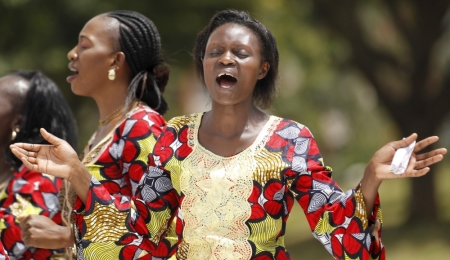 Christians from the World Victory Centre sing hymns during an Easter crusade service for the victims of the Garissa University attack in Kenya's capital Nairobi, April 5, 2015. The son of a Kenyan government official was one of the masked gunmen who killed nearly 150 at a university last week, the interior ministry said on Sunday, as Kenyan churches hired armed guards to protect their Easter congregations.